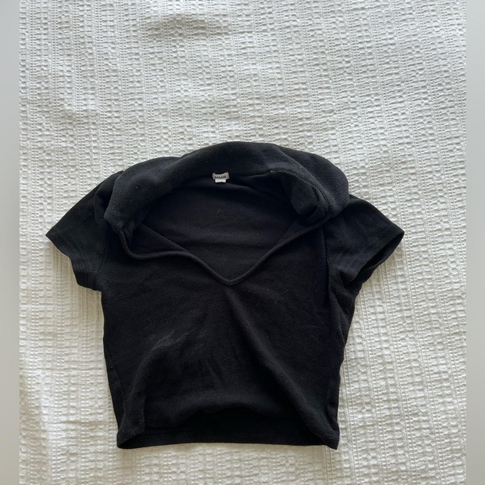 Garage crop top size small and in black.